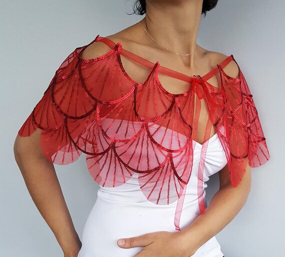 red sequin cape