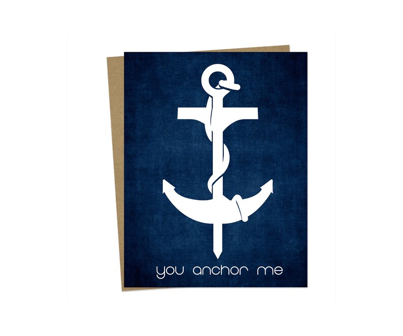 May include: A white anchor with a rope wrapped around it on a blue background. The text "you anchor me" is below the anchor.