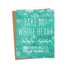 May include: A teal blue card with white text that reads "TAKE MY WHOLE HEART IF YOU KEEP IT SAFE, IT IS YOURS FOR YOUR WHOLE LIFE".