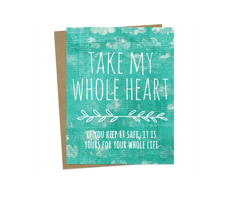 May include: A teal blue card with white text that reads "TAKE MY WHOLE HEART IF YOU KEEP IT SAFE, IT IS YOURS FOR YOUR WHOLE LIFE".