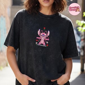 May include: A set of three ceramic mugs with a speckled, matte finish. The mugs are in shades of cream, light grey, and dark grey. Each mug has a simple, minimalist design and a rounded handle.