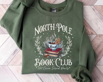 Camiseta gráfica navideña retro divertida del Club del Libro del Polo Norte para amantes de los libros, ideal para mujeres.