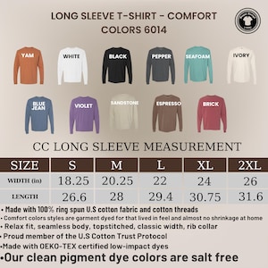 May include: A display of long sleeve t-shirts in various colors, including Yam, White, Black, Pepper, Seafoam, and Ivory. The image includes a size chart with measurements in inches for width and length, ranging from S to 2XL.