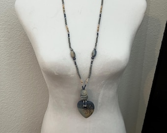 Vintage Heart-Shaped Pendant Necklace Featuring a Lotus Flower Design