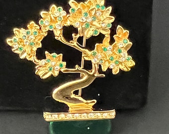Vintage Gold-Tone Bonsai Tree Brooch Featuring Clear and Green Crystals on a Green Base