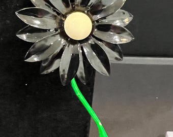 Vintage Enamel Daisy Flower Brooch with Black Petals and a Green Stem