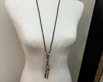 Vintage Giraffe Pendant on a Black Cord Necklace