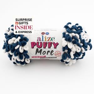 May include: A ball of Alize Puffy More yarn in white and navy blue, with a label. The yarn is a looped chenille style. The label reads "Alize Puffy More" and "Surprise Gifts Inside & Express".