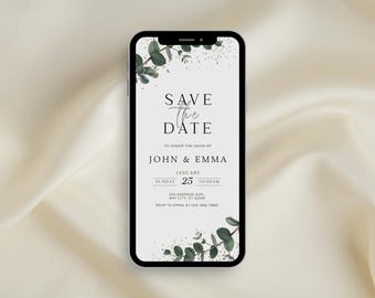 May include: A smartphone displays a wedding invitation with the text "Save the Date." The invitation includes the names John & Emma, the date January 25, and the time 10:00 AM. Eucalyptus greenery and gold accents frame the text on a white background.