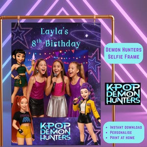 May include: A selfie frame featuring the text "Layla's 8th Birthday" with cartoon characters and the words "K-Pop Demon Hunters." The frame includes illustrations of girls and the text "Demon Hunters Selfie Frame."