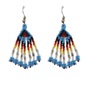 May include: A pair of beaded earrings with a fan-like design. The earrings feature a color palette of blue, red, black, yellow, and white beads. The top portion is blue, transitioning to red and black, with white and yellow strands at the bottom.