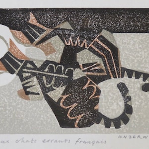 May include: A black and white woodcut print of two cats, with the text "Deux chats errants francais" and the artist's signature "HNDERWOOD" at the bottom.