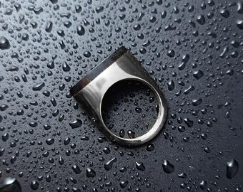 NOX- Anillo de plata 925 con incrustación de madera de ébano con forma