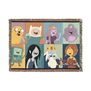 May include: Woven throw blanket featuring Adventure Time characters in a grid pattern. The blanket displays Jake, Finn, Princess Bubblegum, Lumpy Space Princess, BMO, Marceline, Ice King, and Flame Princess. The words "Adventure Time" are at the bottom.