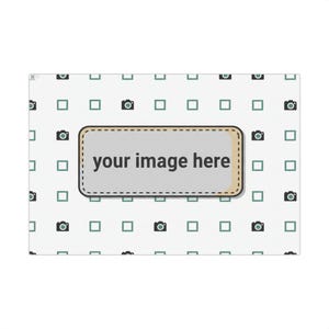 May include: White background with a repeating pattern of green squares and black camera icons. A rectangular, light gray shape with a rounded border and the text "your image here" is centered on the design.
