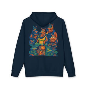 May include: Navy blue hooded sweatshirt featuring a colorful graphic of five cartoon hippos in water, with a man's head submerged below. The hippos are in shades of blue, orange, and yellow. The sweatshirt has a drawstring hood and a kangaroo pocket.