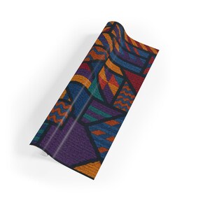 May include: Rolled sheet with a colorful geometric pattern. The design features triangles, zigzags, and other shapes in shades of purple, orange, blue, and teal, outlined in black.