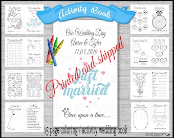 May include: A 15-page wedding activity book with coloring pages and games. The cover features the text "Our Wedding Day" and "Just Married." Includes crayons and various activities like coloring hearts, drawing faces, and word scrambles.