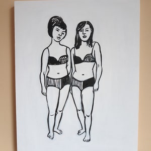 May include: Black and white illustration of two people wearing matching swimsuits. The people are standing side by side and looking at the viewer.