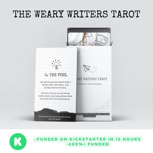 May include: The Weary Writers Tarot card deck in a white box. The box and cards feature text, including "The Weary Writers Tarot" and "O. THE FOOL". The deck was funded on Kickstarter. The box contains a deck of cards.