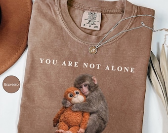 Monkey Punch Comfort Colors® T-Shirt, Baby Monkey Holding Plush Toy, Viral Monkey Animal Lover Tee, Animal Lover Gift