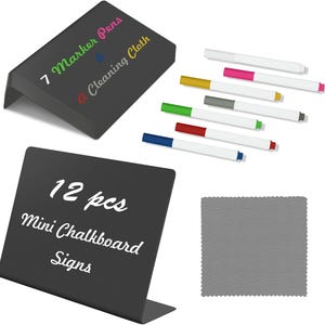 May include: A set of 12 black L-shaped mini chalkboard signs, 7 colored marker pens, and a gray cleaning cloth. The signs feature white text reading 12 pcs Mini Chalkboard Signs, while the packaging displays 7 Marker Pens & a Cleaning Cloth.