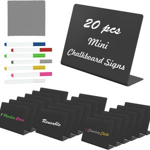 May include: A set of 20 black L-shaped mini chalkboard signs, six colored marker pens, and a gray cleaning cloth. The signs are rectangular with a smooth finish. Text on the signs includes 20 pcs Mini Chalkboard Signs, 7 Marker Pens, Reusable, and A Cleaning Cloth.