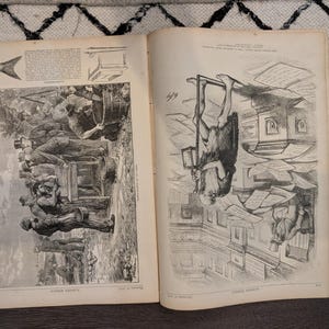 May include: An open book with two black and white illustrations. The left page depicts a group of people, some in hats, interacting with barrels and a cart. The right page shows a person hanging upside down in a room with papers.