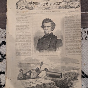 May include: An antique copy of Harper's Weekly, dated May 10, 1862, featuring a portrait of General O. M. Mitchell and an illustration of soldiers. The newspaper's masthead reads "Journal of Civilization."