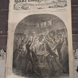 May include: A vintage copy of Harper's Weekly, Journal of Civilization, dated March 29, 1862. The cover features a detailed black and white illustration of a gathering of men. The newspaper shows signs of age and wear.