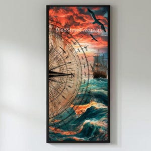 Può includere: Un'opera d'arte incorniciata a tema nautico con una bussola, velieri e gabbiani contro un cielo al tramonto. L'opera d'arte ha un'estetica vintage con una rosa dei venti dettagliata e onde oceaniche turbolente. Il testo "WebStoreCreativity" è visibile.