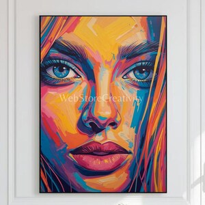 May include: A vibrant, colorful portrait of a woman's face. The artwork features bright blue eyes, full red lips, and a mix of yellow, orange, pink, and blue hues. The text "WebStoreCreativity" is visible.