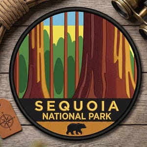 May include: Embroidered patch featuring a Sequoia National Park design. The patch has a black border, with a colorful illustration of redwood trees and the text "SEQUOIA NATIONAL PARK". A bear silhouette is at the bottom.