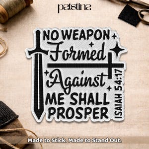 May include: Embroidered patch with the text "NO WEAPON Formed Against ME SHALL PROSPER" and "ISAIAH 54:17". The patch features a sword and cross design in black and white. The patch is made to stick.