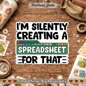 May include: A white sticker with the text "I'M SILENTLY CREATING A SPREADSHEET FOR THAT" in bold black letters. The sticker has a green spreadsheet graphic and is on a wooden surface. The brand name "Patchesby Julia" is at the top.