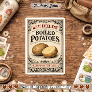 May include: A rectangular sticker with the text "WHAT EXCELLENT BOILED POTATOES" and "EXEMPLARY VEGETABLE" in a vintage style. The sticker features illustrations of two potatoes, one whole and one cut in half. The sticker is on a wooden surface.