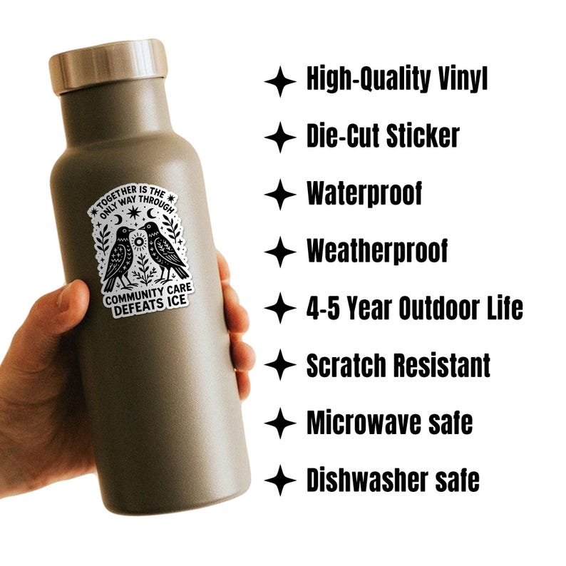May include: A matte olive green water bottle with a silver lid, featuring a sticker with two black birds and the text "TOGETHER IS THE ONLY WAY THROUGH COMMUNITY CARE DEFEATS ICE". The bottle is labeled as high-quality vinyl, waterproof, and dishwasher safe.