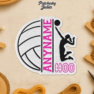 May include: Embroidered patch featuring a volleyball design with the text "ANYNAME" in pink. A black silhouette of a volleyball player is jumping to spike the ball. The patch also includes the number "00".