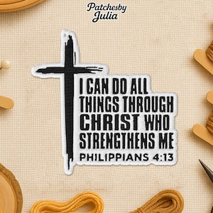 May include: Embroidered patch with a black cross and the text "I CAN DO ALL THINGS THROUGH CHRIST WHO STRENGTHENS ME PHILIPPIANS 4:13". The patch has a white border. Suitable for application on clothing or accessories.