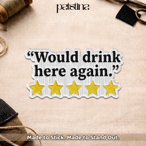 May include: Embroidered patch with the text "Would drink here again." in black, with five yellow star ratings. The patch has a white border and is on a beige fabric background. The brand name "patstina" is at the top.