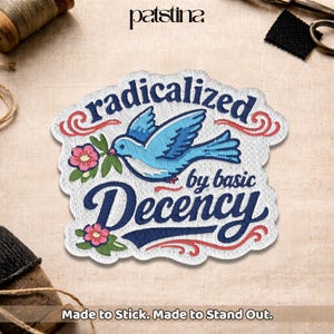 May include: Embroidered patch featuring a blue bird with a sprig of pink flowers. The patch reads "radicalized by basic decency" in a decorative font. The patch has a white border and is on a beige background. The text "Made to Stick. Made to Stand Out." is at the bottom.
