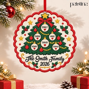 May include: A round, embroidered Christmas tree ornament with a scalloped red border. The design features a green tree decorated with yellow stars, red ornaments, and white baubles labeled Emily, Sadia, Max, Henry, David, and Sophia. Text reads The Smith Family 2026.