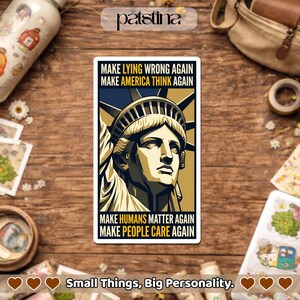 May include: A rectangular sticker featuring a stylized illustration of the Statue of Liberty. The image is in shades of gold, blue, and white, with text that reads "MAKE LYING WRONG AGAIN" and "MAKE AMERICA THINK AGAIN".