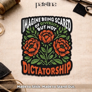 May include: Embroidered patch with the text "IMAGINE BEING SCARED OF DIVERSITY BUT NOT DICTATORSHIP" in white and orange. The patch features three orange roses with green leaves on a black background. The patch is rectangular.