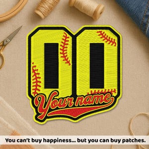 May include: A yellow and black baseball-themed patch with the number "00" and red stitching details. The patch includes the text "Your name" in a script font and the phrase "You can't buy happiness... but you can buy patches."