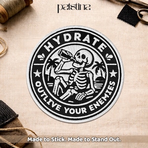 May include: Circular black and white patch with the text "HYDRATE OUTLIVE YOUR ENEMIES." The design includes a skeleton drinking from a bottle, palm trees, and stars. The text "Made to Stick. Made to Stand Out." is at the bottom.