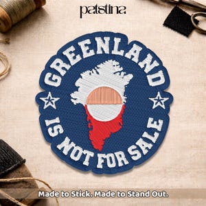 May include: Embroidered patch with a blue border and the words "GREENLAND IS NOT FOR SALE" in white. The patch features a map of Greenland in white, red, and tan. The text "Made to Stick. Made to Stand Out." is at the bottom.