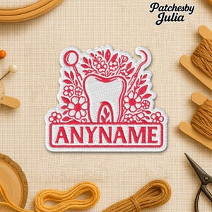 May include: Embroidered patch featuring a white tooth design with red floral accents and dental tools. The patch includes the text "ANYNAME" in a red rectangular banner. The patch is surrounded by sewing supplies.
