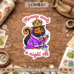 May include: A die-cut sticker featuring a calico cat wearing a gold crown and a purple robe, holding a martini glass with a cherry. The text reads Momma needs a night off in pink script. The cat has a tired expression and a tongue sticking out.