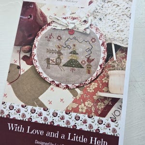 May include: A trio of ceramic mugs with a speckled, matte finish in cream, light grey, and dark grey. Each mug features a simple, minimalist design, ideal for tea or coffee.